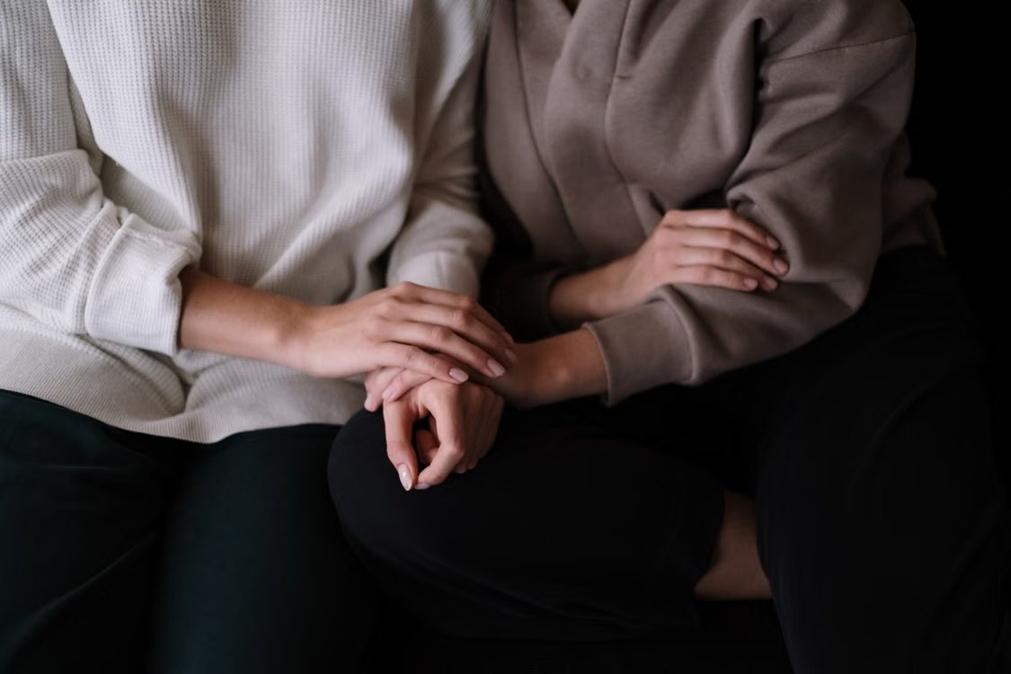 Caring, warm hands representing emotional support